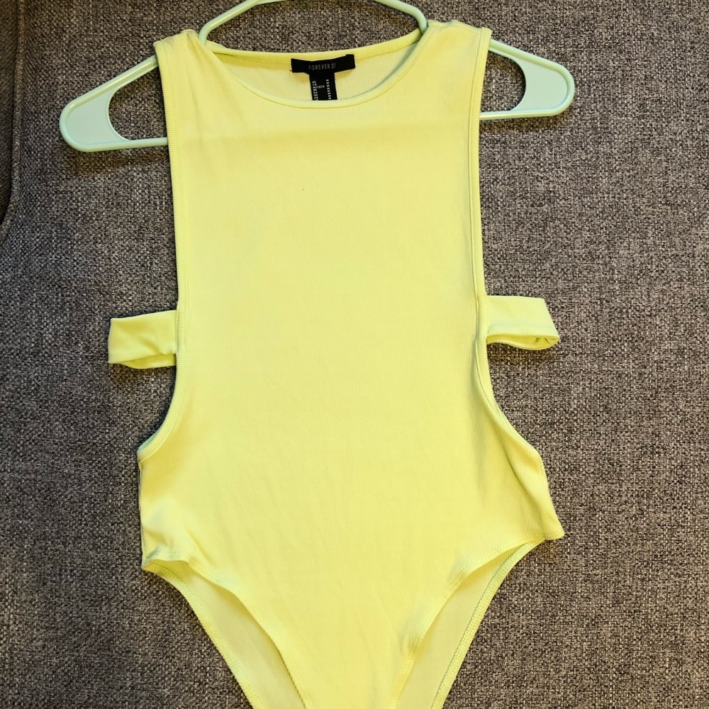 Neon yellow body suit
